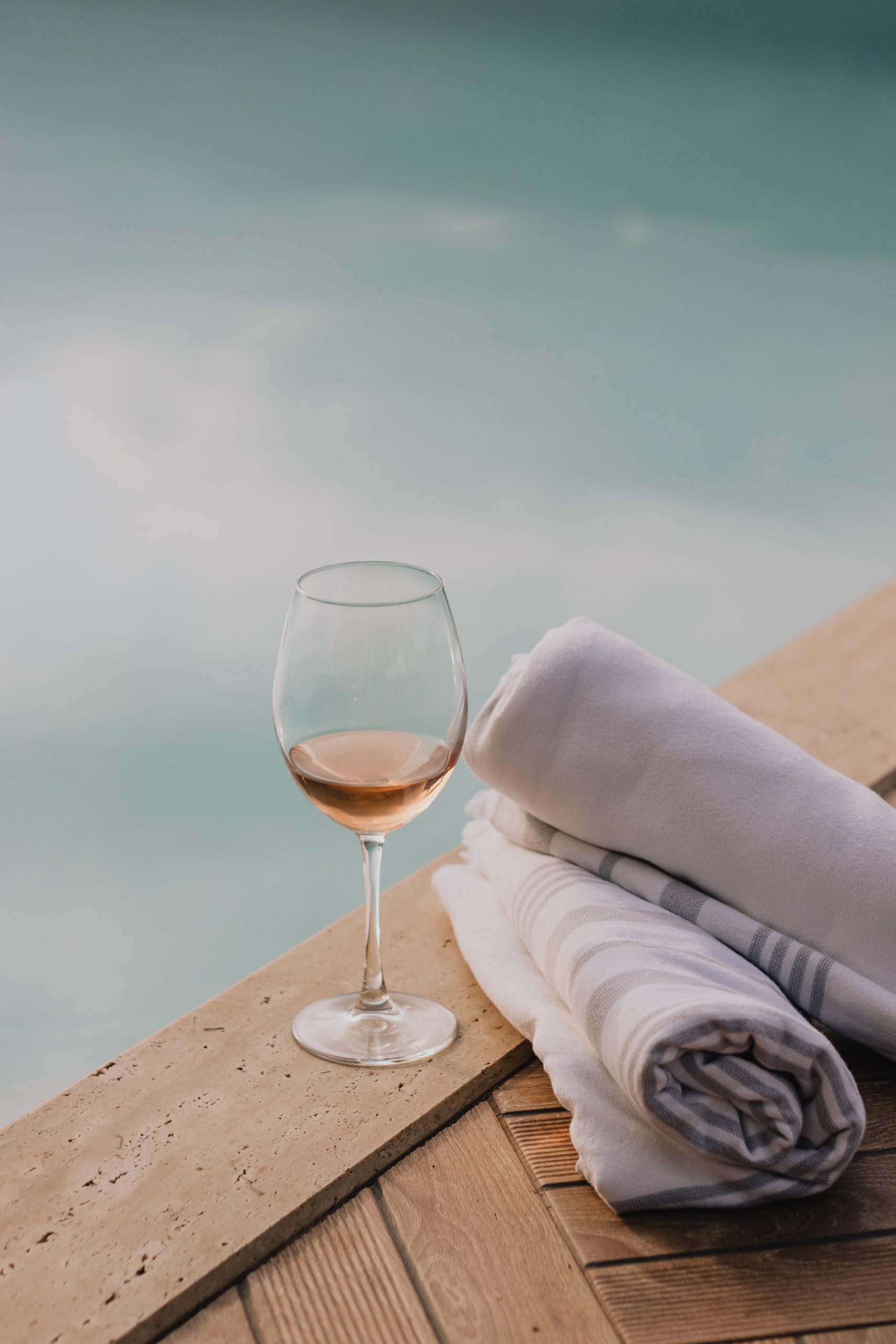 Glass of Sirène rosé by the pool